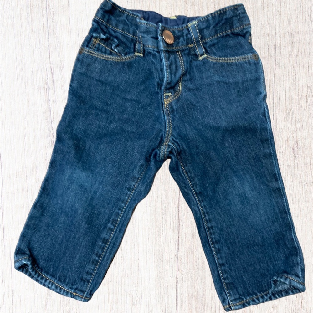 ⚡️5/$25 SALE⚡️ Baby 1696 blue jeans 12 Mo this with ruffle details